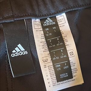 Black and white Adidas pants
